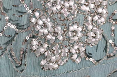 Lot 63 - A flapper dress of pale sea-blue crêpe chiffon, circa 1929