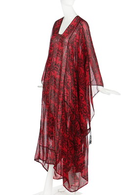 Lot 135 - A Thea Porter chiffon abaya printed with calligraphic beasts, 1970s