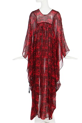 Lot 135 - A Thea Porter chiffon abaya printed with calligraphic beasts, 1970s