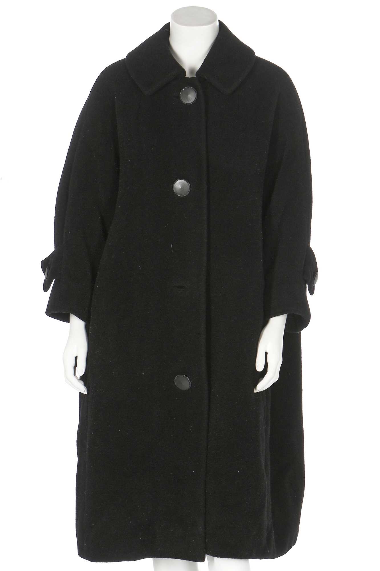 Lot 83 - A Christian Dior by Yves Saint Laurent couture black wool tent coat, 1958-60