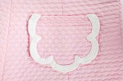 Lot 100 - A Courrèges pale-pink cotton matelassé playsuit, late 1960s