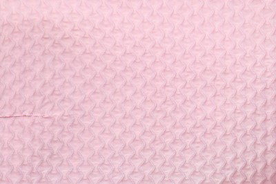 Lot 100 - A Courrèges pale-pink cotton matelassé playsuit, late 1960s