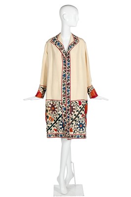 Lot 65 - An ivory silk summer coat made from a Central Asian embroidered suzani, circa 1928