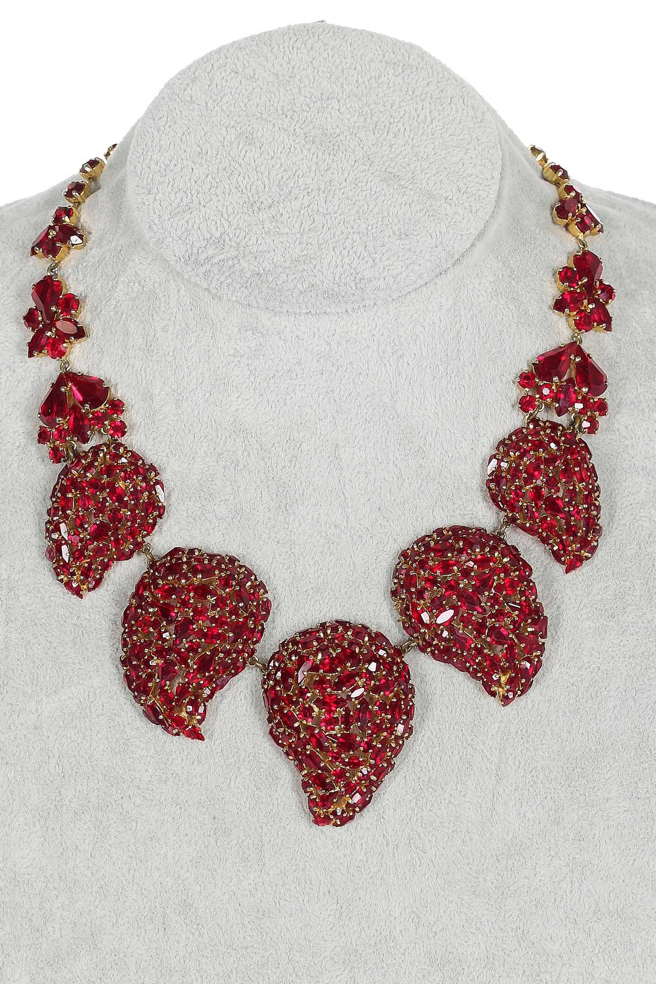 Lot 24 - A Dior necklace of faceted 'ruby' rhinestones set in a gilt metal mount, 1962