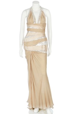 Lot 252 - A Versace pale gold chiffon 'Donna' evening gown, Autumn-Winter 2006
