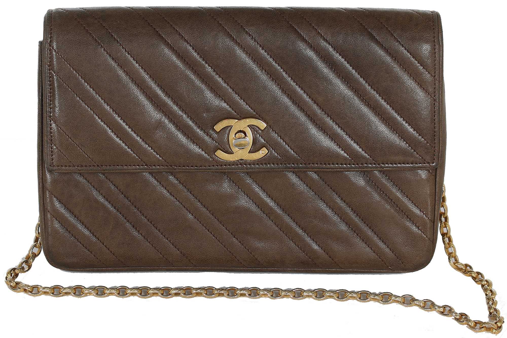 Click for high resolution Lot 7 - A Chanel quilted lambskin leather handbag, 1980s
