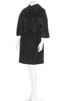 Lot 87 - An American licensed copy of a Balenciaga black wool coat, circa 1960