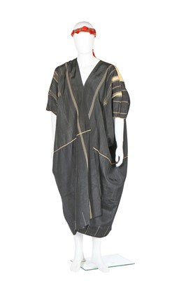 Lot 445 - A black and gold woven Aba robe, Syrian, 1920-30