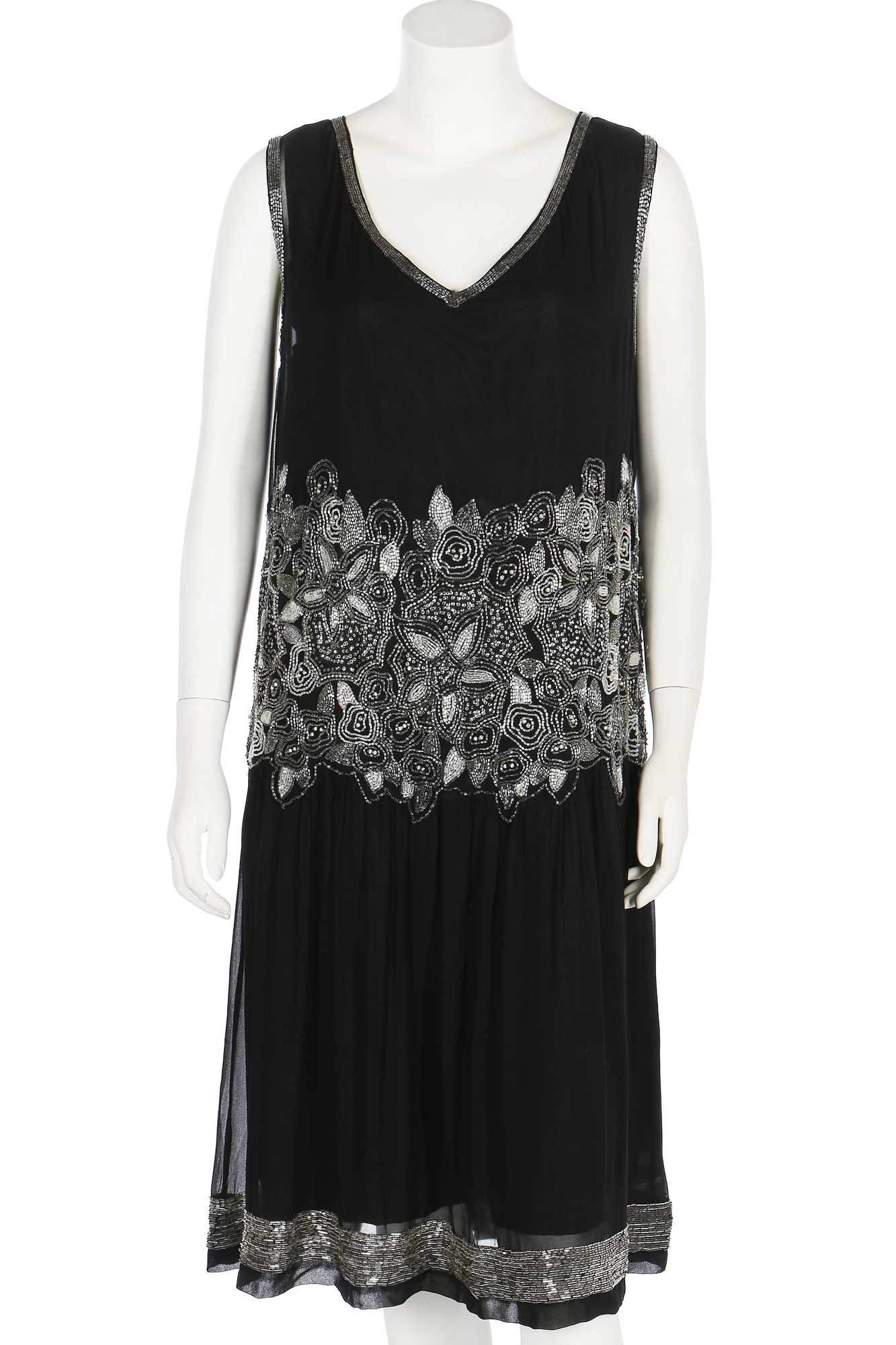 Click for high resolution Lot 61 - A beaded black chiffon flapper dress, circa 1926