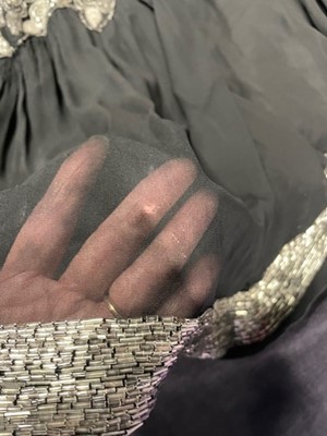 Lot 61 - A beaded black chiffon flapper dress, circa 1926