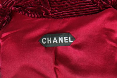 Lot 149 - A Chanel couture plum velvet jacket, circa 1989