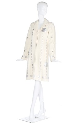 Lot 150 - A Chanel off-white bouclé cotton-blend coat, circa 2000