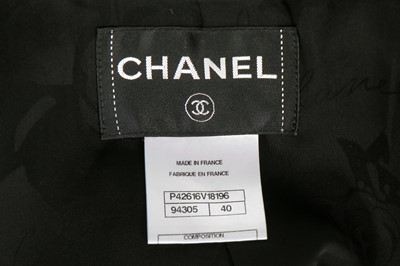 Lot 151 - A Chanel black wool-blend suit, late 1990s