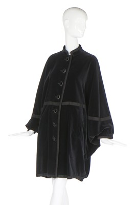 Lot 157 - An Yves Saint Laurent black velvet trapezoid coat, circa 1980