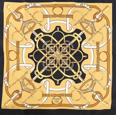 Lot 24 - An Hermès 'Eperon d'Or' silk scarf, marked...