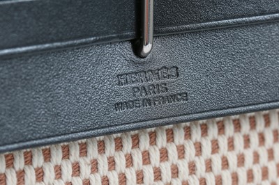 Lot 130 - An Hermès Herbag pochette, modern