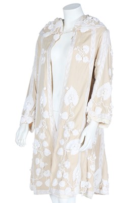 Lot 402 - An embroidered and appliquéd beige wool jacket, circa 1910