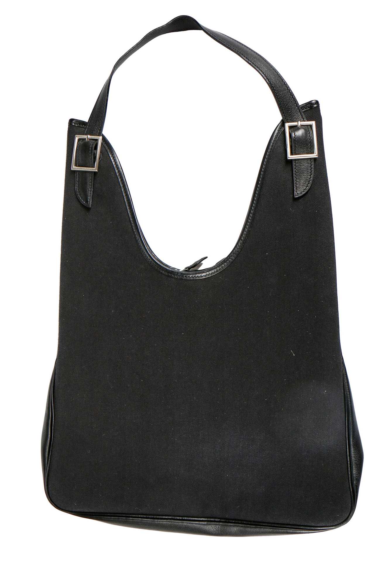 Lot 128 - An Hermès black canvas Massi bag, modern,