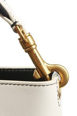 Lot 137 - A Céline Sangle off-white leather handbag, modern