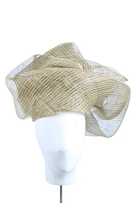 Lot 145 - A Philip Treacy black raffia ribbed mesh top hat, modern