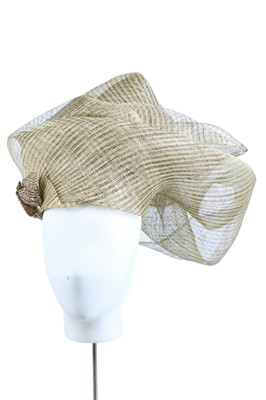 Lot 145 - A Philip Treacy black raffia ribbed mesh top hat, modern