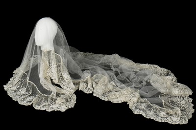 Lot 457 - A tulle bridal veil edged in 1860s Brussels Point de Gaze