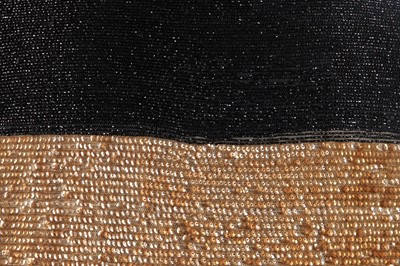 Lot 231 - A gold and black sequined opera coat, 1920s