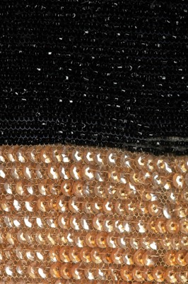 Lot 231 - A gold and black sequined opera coat, 1920s