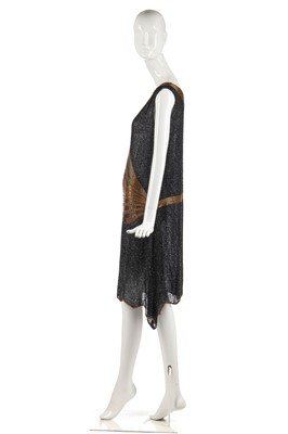 Lot 244 - A black and gold beaded flapper dress, 1928-29