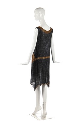 Lot 244 - A black and gold beaded flapper dress, 1928-29