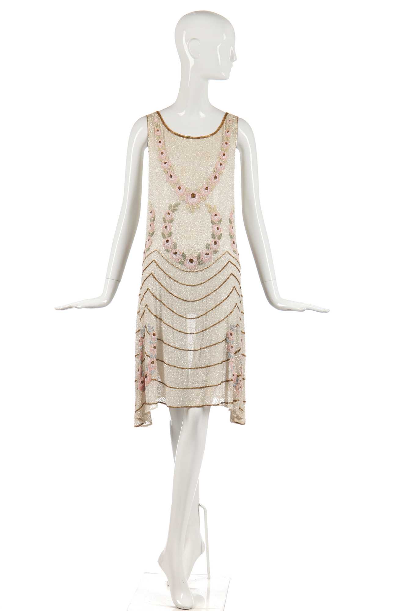 Lot 248 - A floral beaded flapper dress, late 1920s.