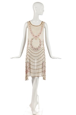 Lot 248 - A floral beaded flapper dress, late 1920s.