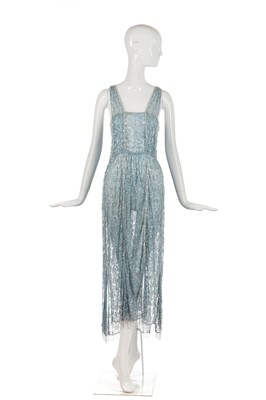 Lot 258 - A beaded pale blue tulle evening gown, circa 1930