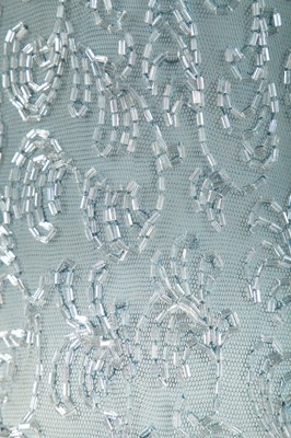 Lot 258 - A beaded pale blue tulle evening gown, circa 1930