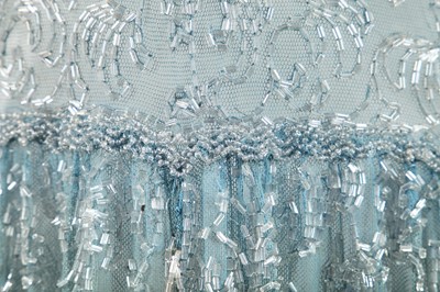 Lot 258 - A beaded pale blue tulle evening gown, circa 1930