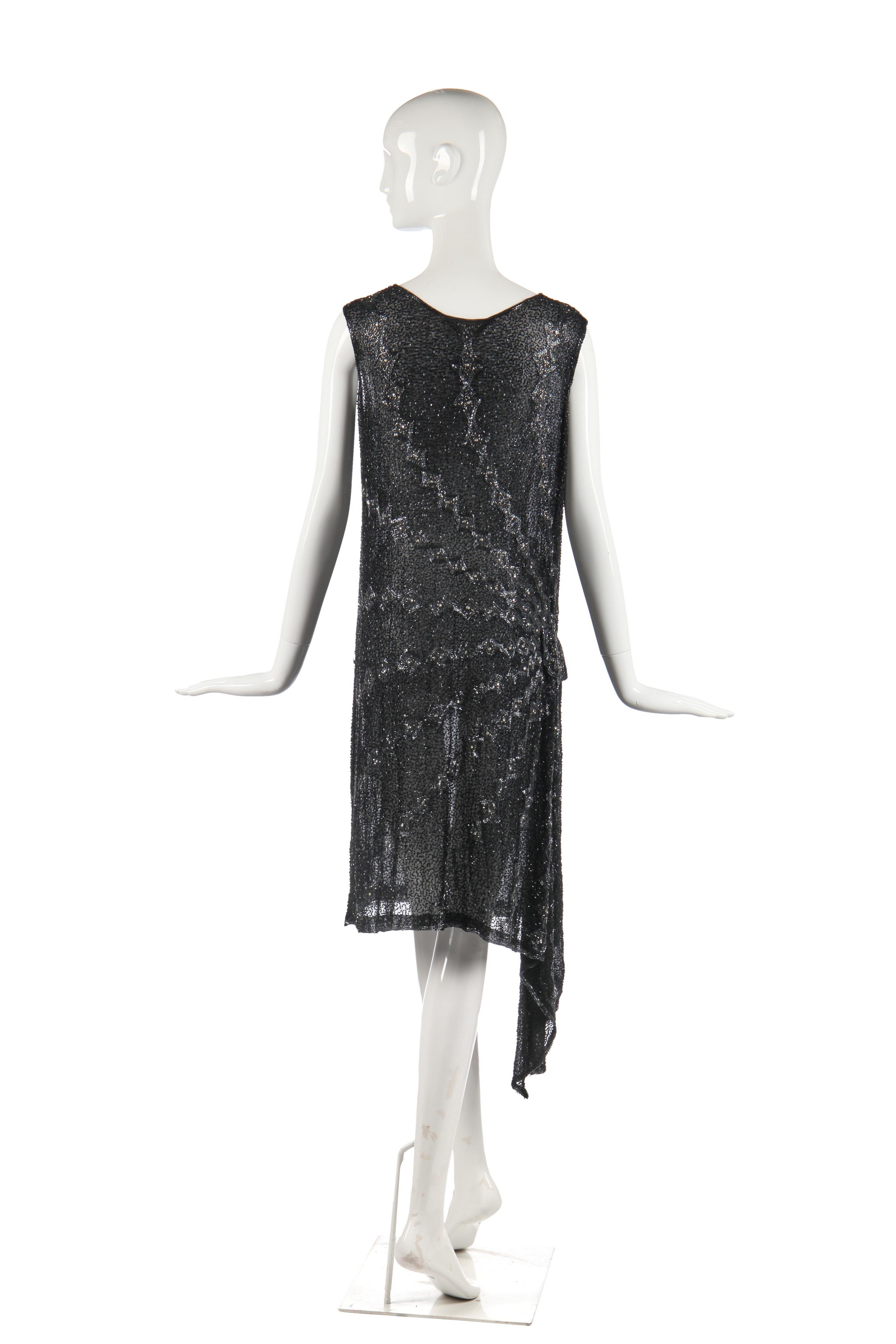 Lot 245 - A black and silver beaded flapper dress,