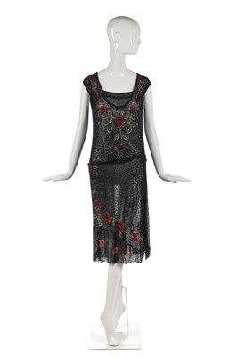 Lot 241 - An embroidered and beaded flapper dress, circa 1920