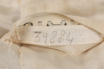 Lot 51 - A Chanel couture pale-gold brocaded jacket, 1969-70