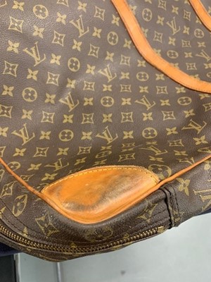 Lot 5 - A Louis Vuitton monogrammed canvas and leather suitcase, large