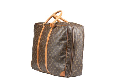 Lot 9 - A Louis Vuitton monogrammed canvas and leather suitcase, small