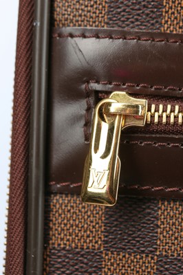 Lot 119 - A Louis Vuitton Pégase Damier Ebène canvas and leather suitcase, small