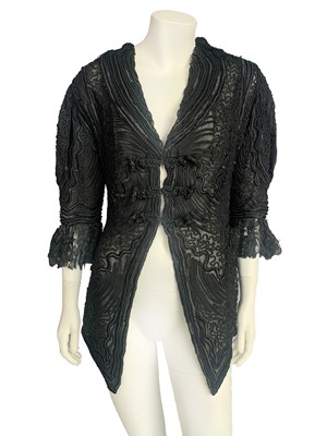 Lot 403 - A good black soutache lace jacket, circa 1910