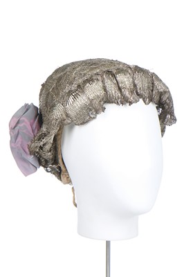 Lot 421 - A lavishly embroidered regional bonnet, German, late 19th century