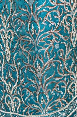 Lot 448 - An embroidered blue wool kaftan, Indian, probably 1950s