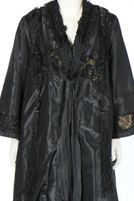 Lot 393 - Three black coats, circa 1918