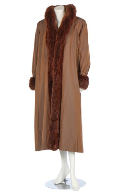 Lot 122 - An Yves Saint Laurent fur-lined raincoat, circa 1989