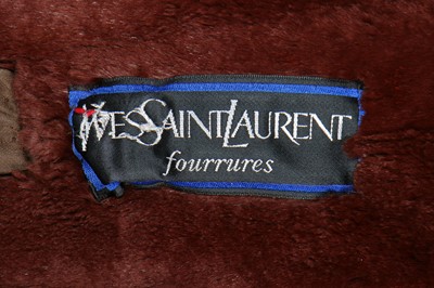 Lot 122 - An Yves Saint Laurent fur-lined raincoat, circa 1989