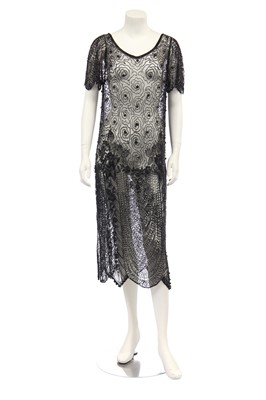 Lot 398 - A beaded black tulle dress, early 1920s