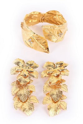 Lot 146 - A Bijoux Cascio gilt metal leaf cuff bracelet,...
