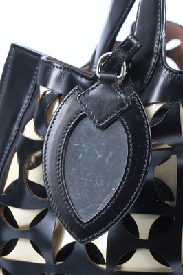 Lot 31 - An Alaïa laser-cut leather bucket-style bag, modern